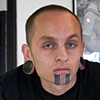 Tattoo artist at Enigma